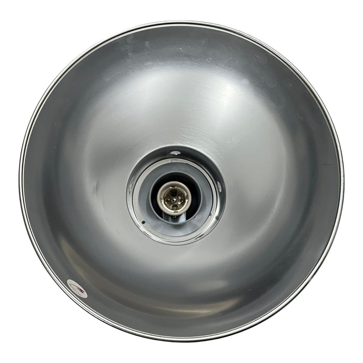 A top-down view of a metallic silver dome-shaped light fixture or reflector with a central socket, isolated on a white background.