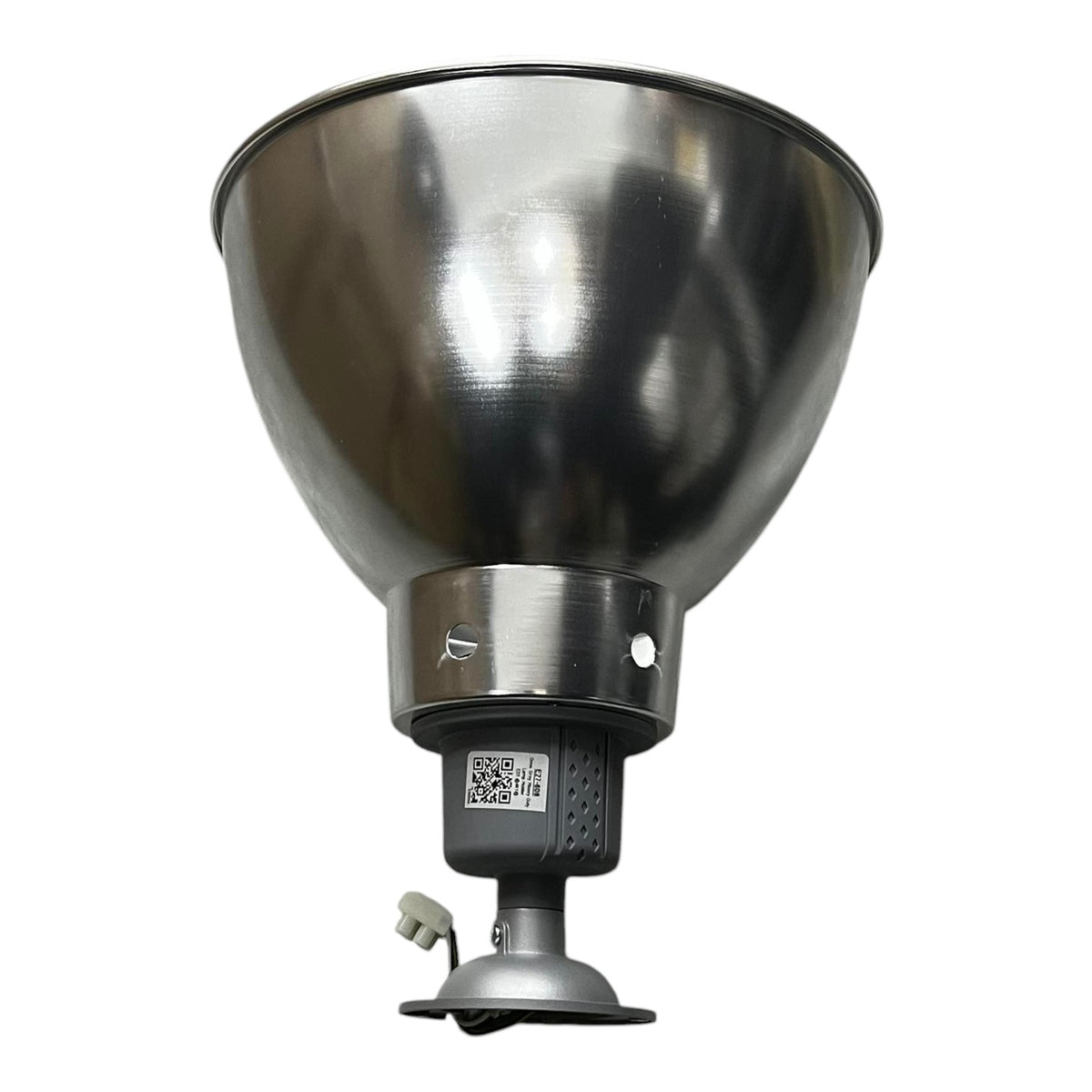 A stainless steel outdoor floodlight with a reflective metal reflector, a black motor housing, and a mounting base, shown against a plain white background.