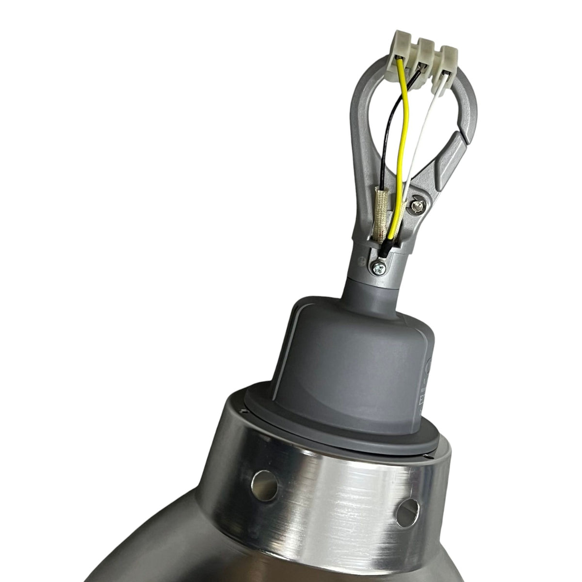Close-up of a metal lamp or fixture component with a gray plastic collar, silver brushed metal ring, and a clip holding yellow and black wires, on a white background.