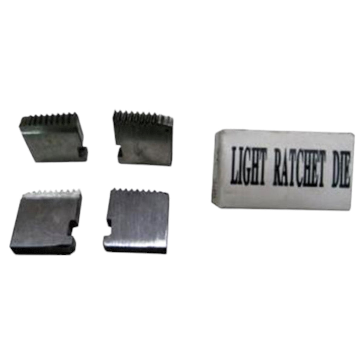 Four small metal die components and one rectangular white block printed with the words 'LIGHT RATCHET DIE' on a plain white background.
