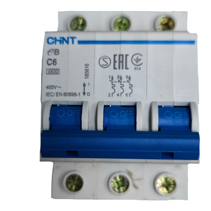 CHNT C6 3-pole circuit breaker with blue and white plastic housing, featuring green terminal screws on the top and bottom terminals.