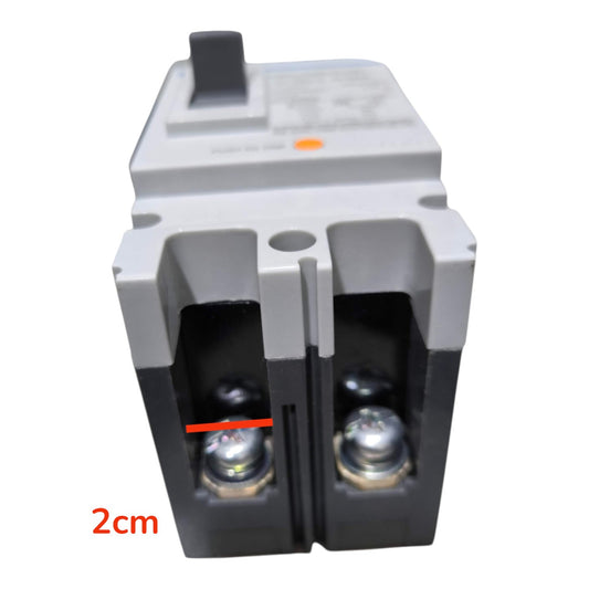 A two-pole electrical circuit breaker with a gray top housing and black lower housing, featuring two terminal posts. A red horizontal line highlights the width of the breaker body, with a red '2cm' text overlay indicating the dimension.
