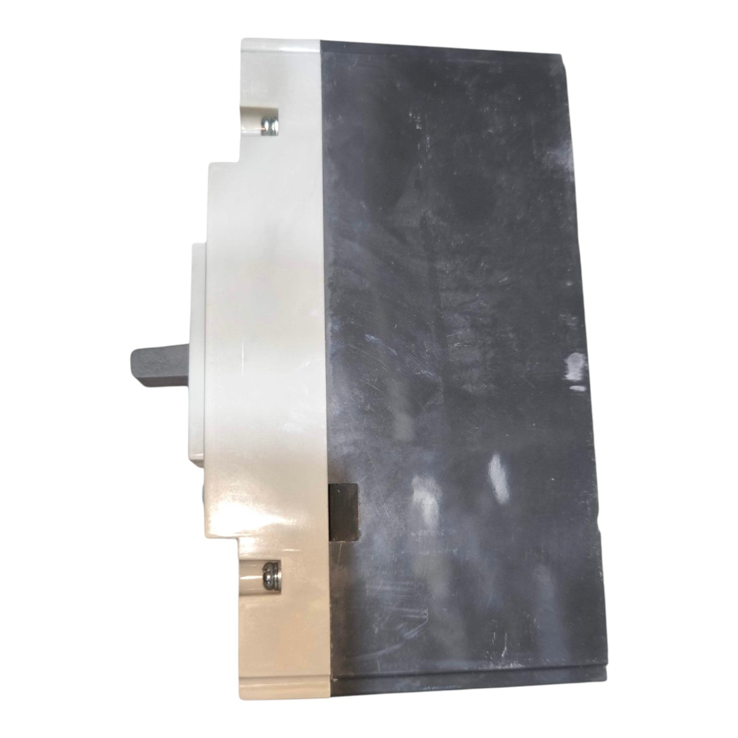 A heavy-duty industrial metal block or housing component, featuring a brushed silver aluminum body on one side and a dark gray textured panel on the other, with a small gray protruding tab on the left.