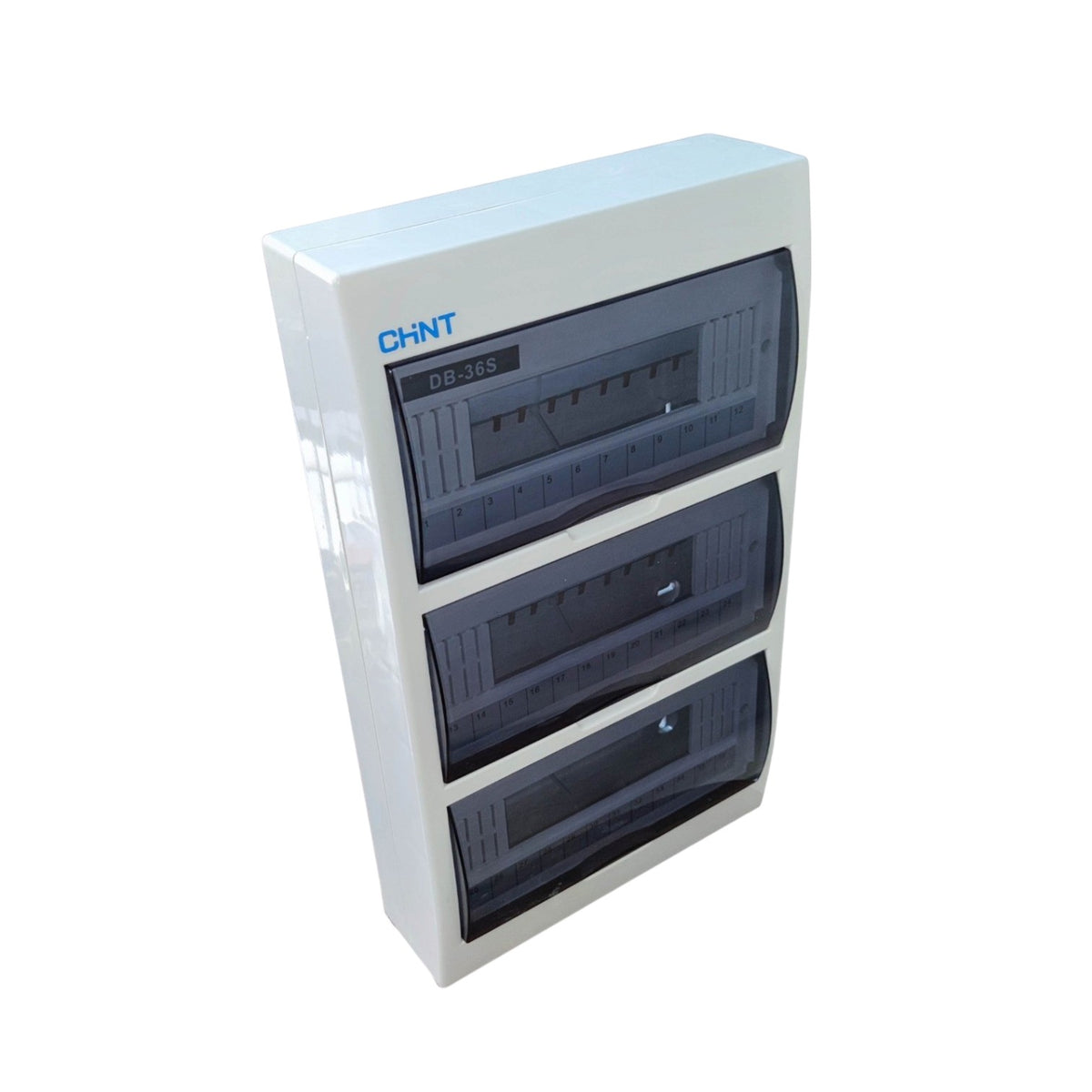 A white CHNT electrical distribution board with three transparent-front compartments, shown at a three-quarter angle on a white background.
