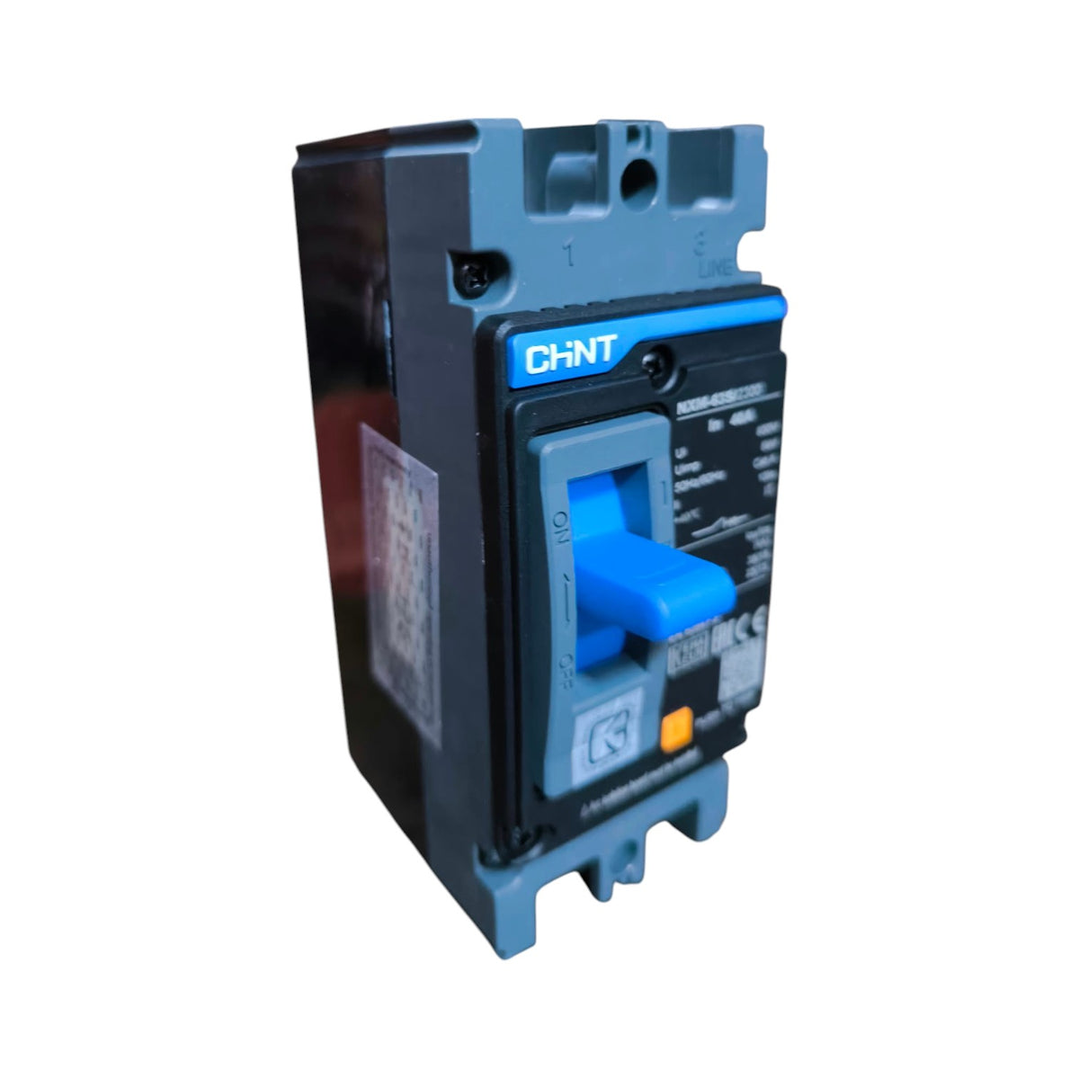 A CHNT circuit breaker with a blue handle and blue top/bottom mounting pieces, set against a plain white background.