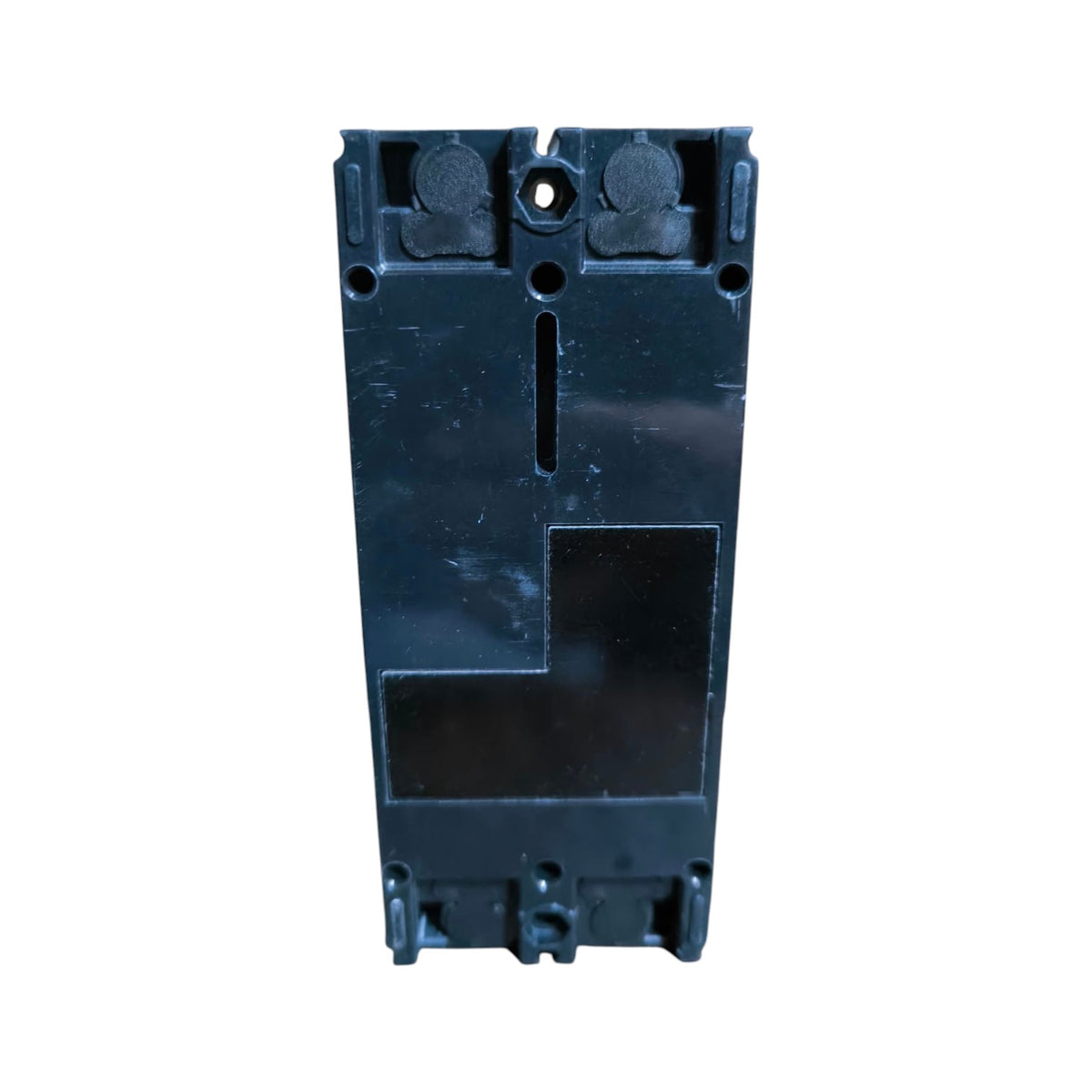 A black plastic electrical component or connector housing shown from the back, isolated on a white background.