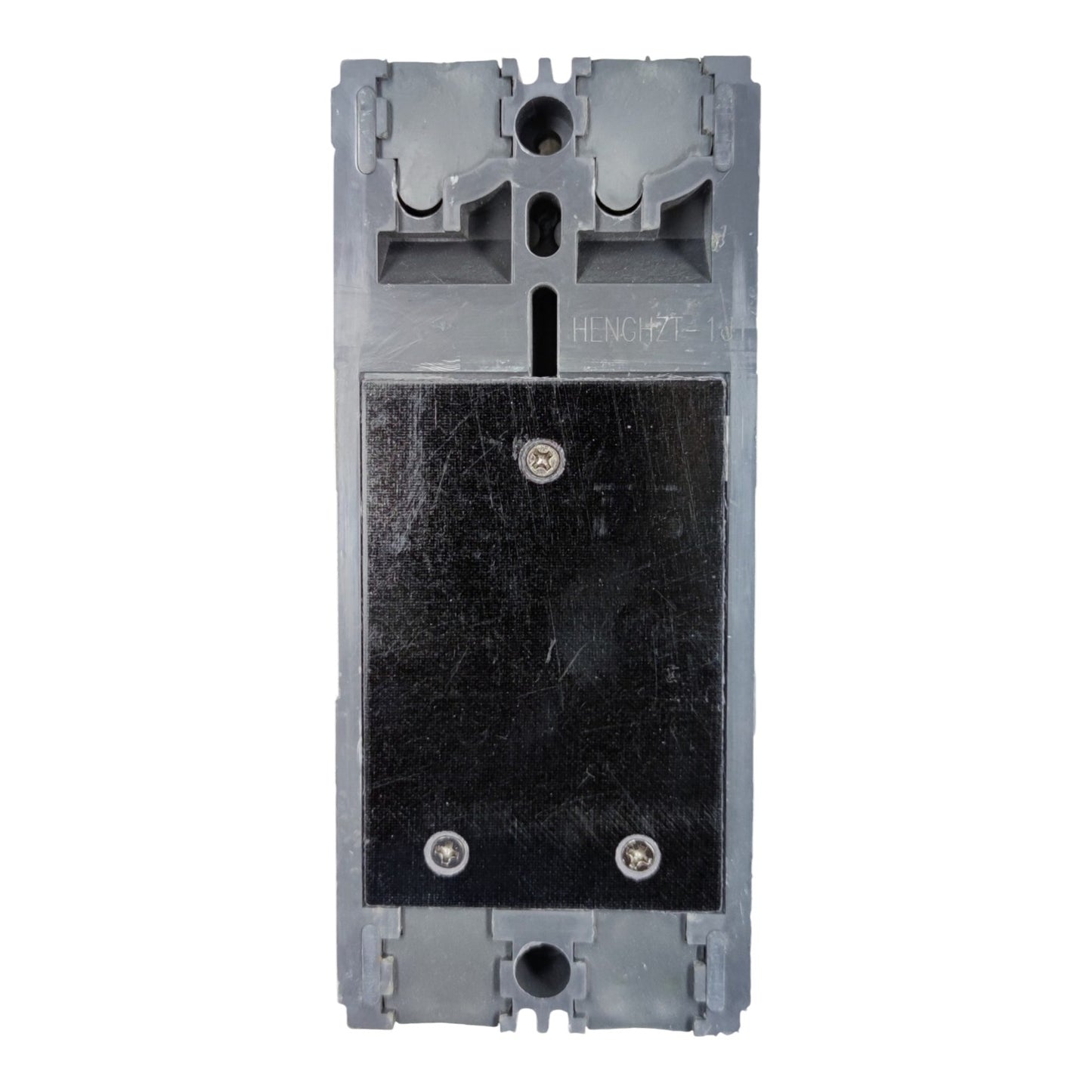 A gray plastic electrical component or switch module with a large black rectangular panel secured by two screws, photographed against a plain white background.
