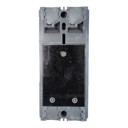 A gray plastic electrical component or switch module with a large black rectangular panel secured by two screws, photographed against a plain white background.