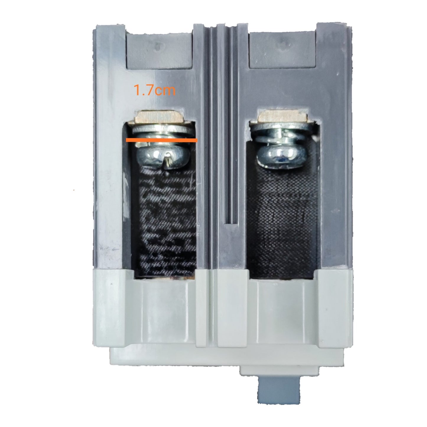 A close-up product shot of a gray plastic dual-channel filter assembly with two black mesh filter cartridges visible inside. An orange measurement label reading '1.