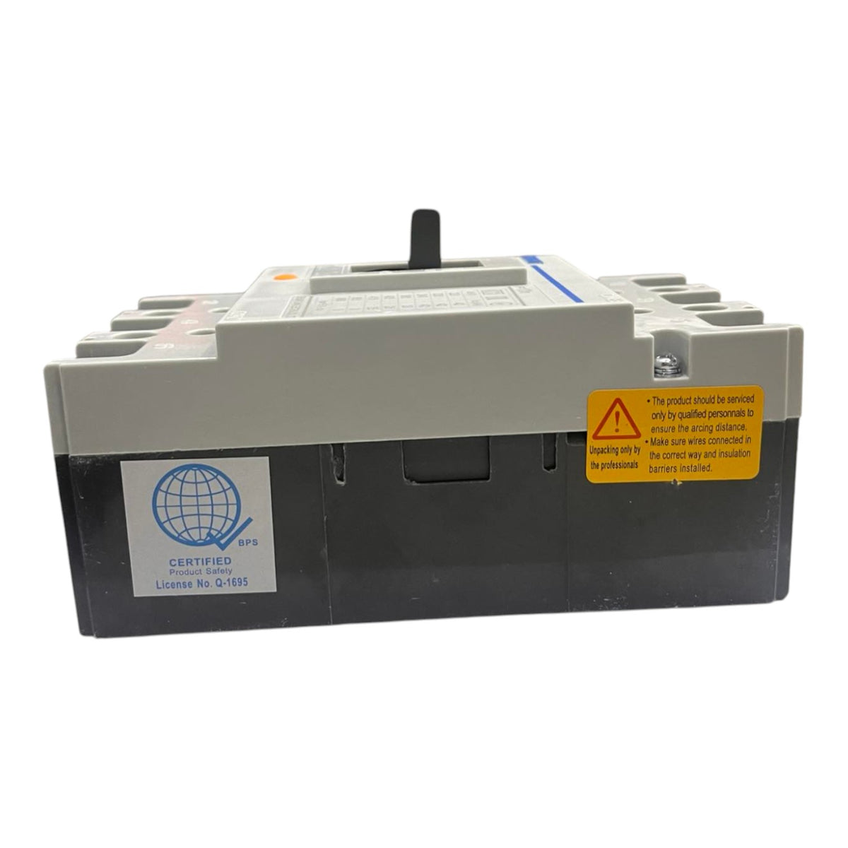 An industrial electrical circuit breaker with a gray top cover, black base, and a yellow warning label on the side, photographed against a solid white background.