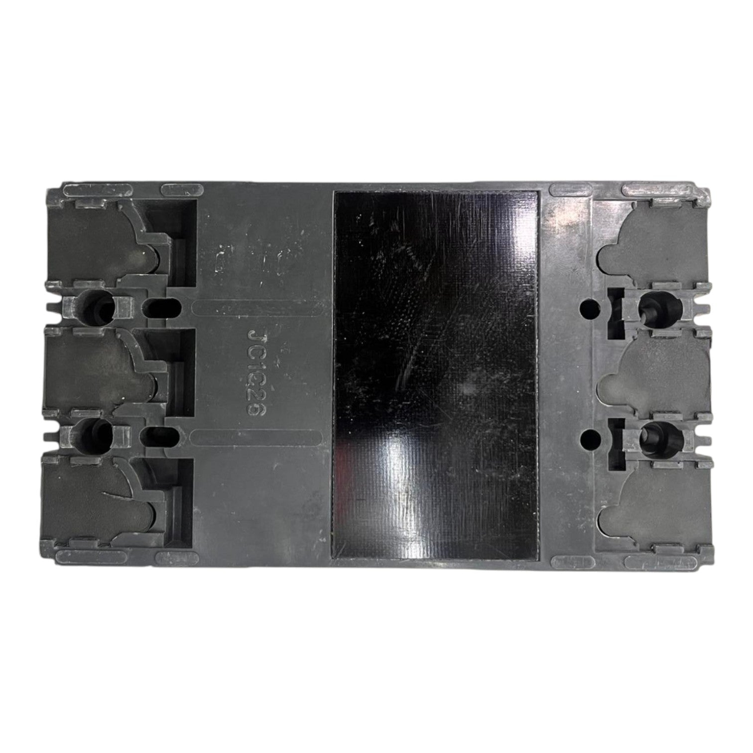 A dark gray molded plastic component, likely a mechanical bracket or housing part, featuring a glossy black central panel and molded structural details on both sides, shown against a plain white background.
