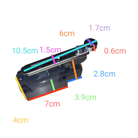 A small black mechanical component shown on a white background with multiple colored dimension labels and measurement lines indicating dimensions such as 10.5cm, 7cm, 4cm, 1.