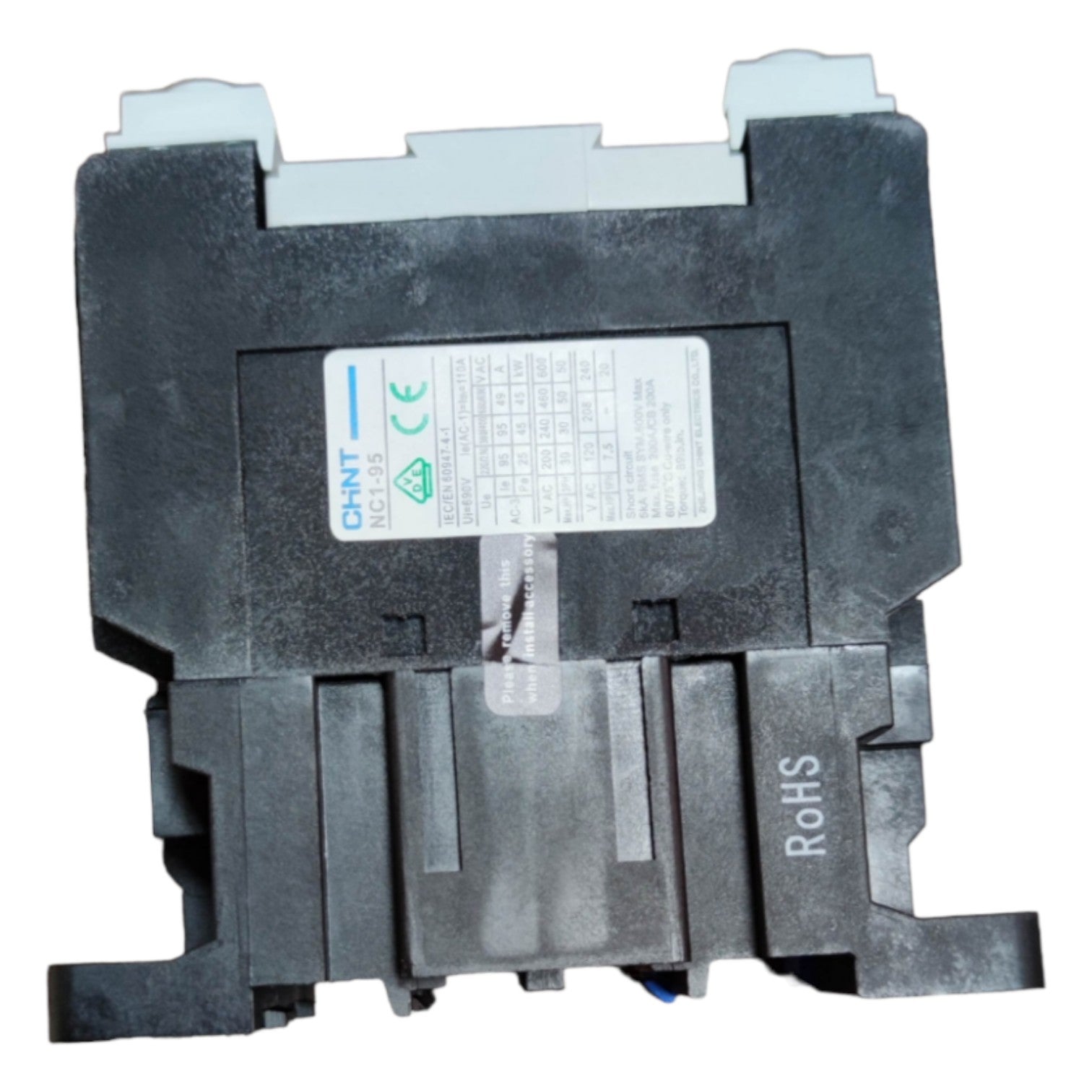 Black electronic component with a label on a white background
