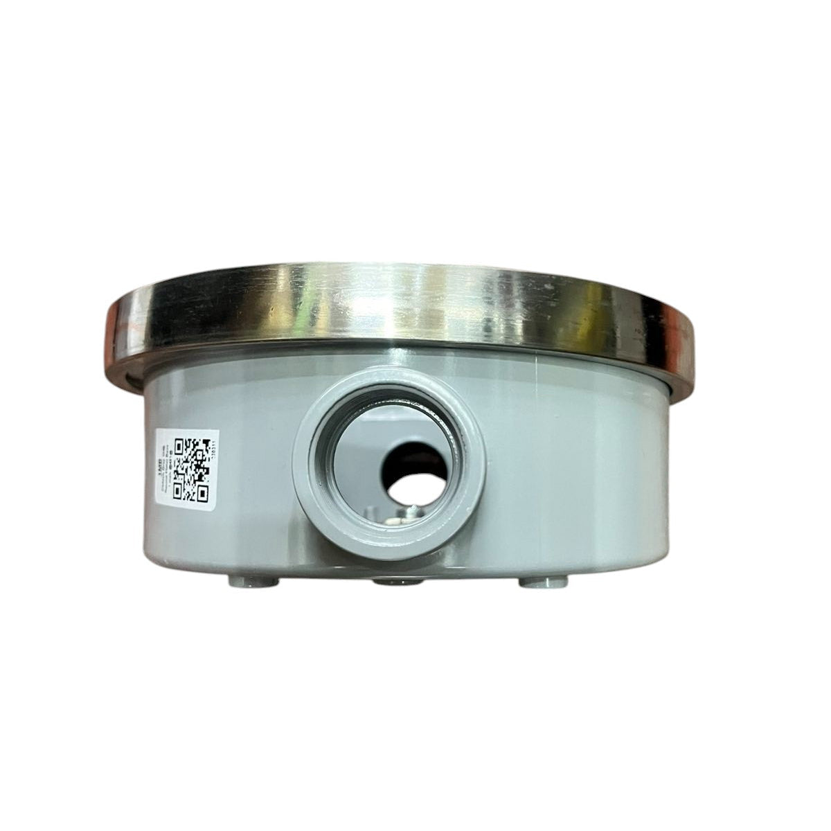 Metallic cylindrical component with a shiny metallic top on a white background