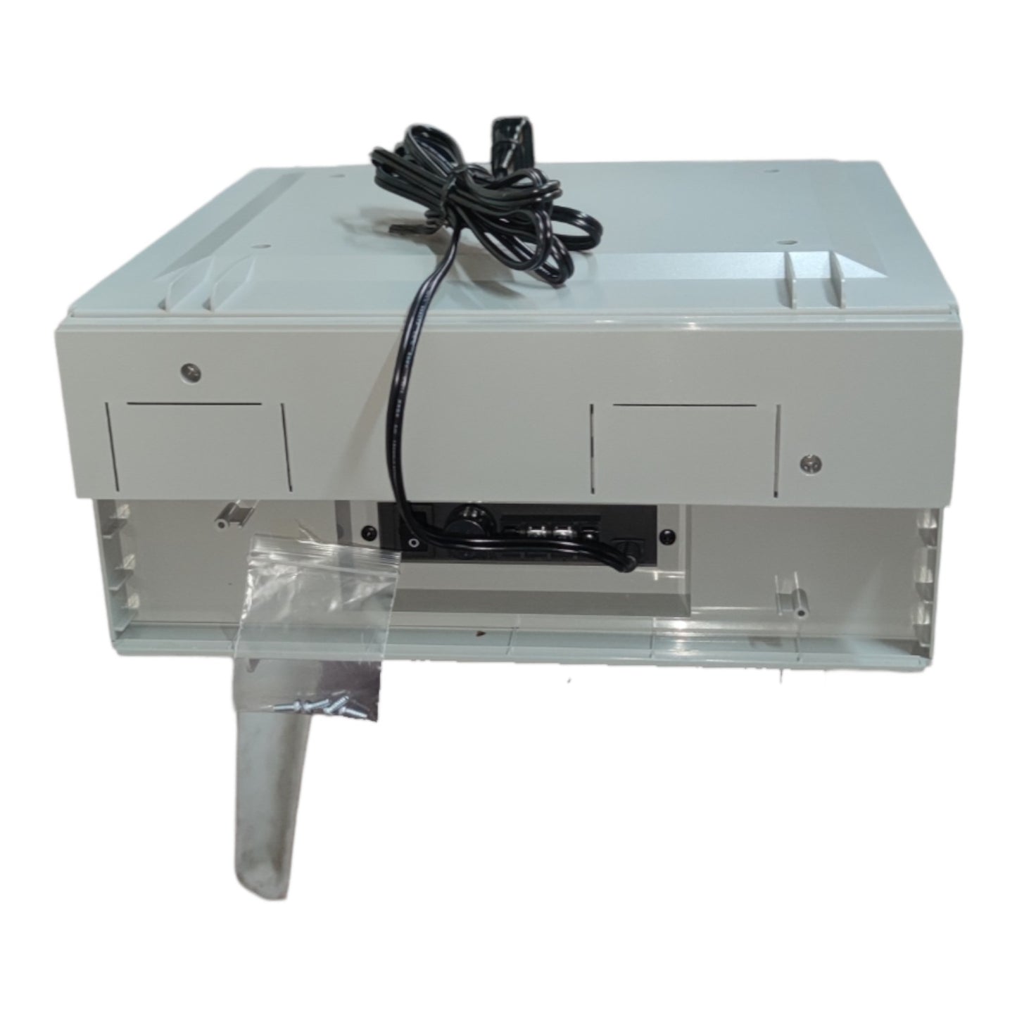 White electronic device with a power cord on a white background