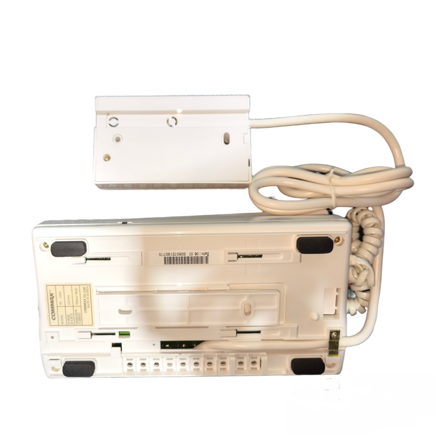 Electronic device with a power cord on a white background