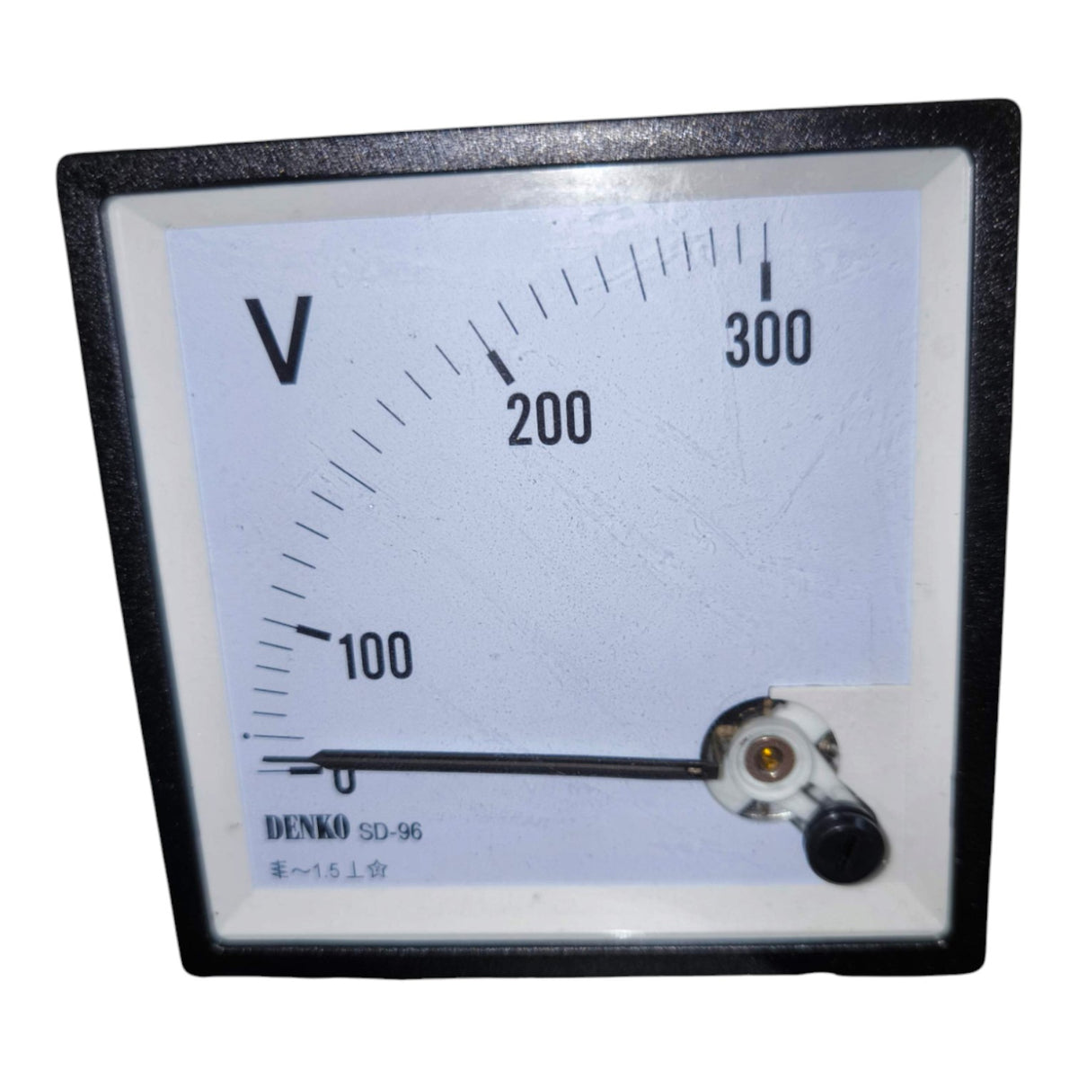A square analog voltmeter gauge with a black frame, white face, and black needle, showing a scale from 0 to 300 with 'V' printed at the top left. The brand name 'DENKO' is visible at the bottom left of the face.