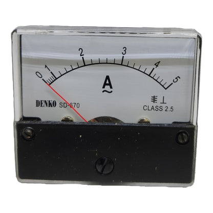 A Denko SD-670 analog ammeter with a black case, clear protective cover, and a white face showing a red needle and black scale markings.