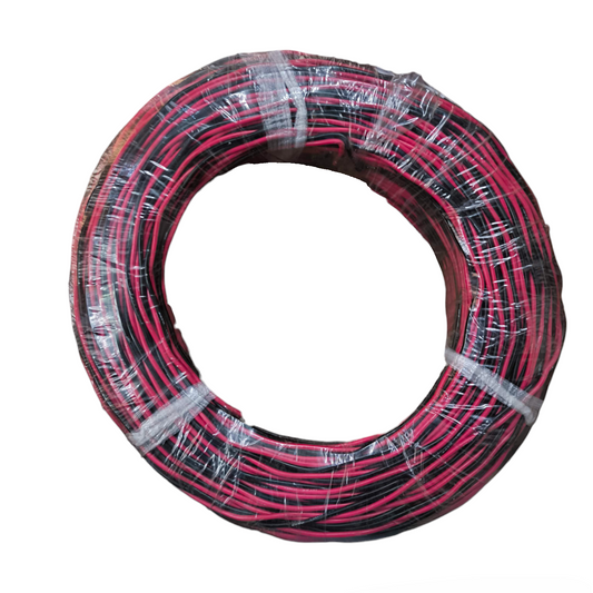 Coiled red and black cable on a white background