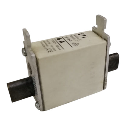 Electrical component with metallic connectors on a white background