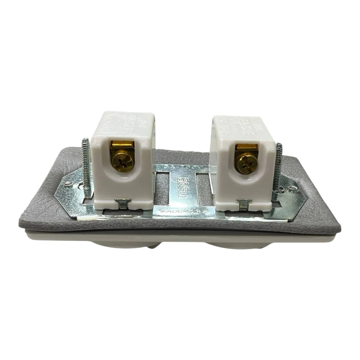 A two-gang electrical wall switch module featuring two white ceramic screw-in sockets with brass-colored contacts, mounted on a galvanized steel plate with a gray mounting frame.