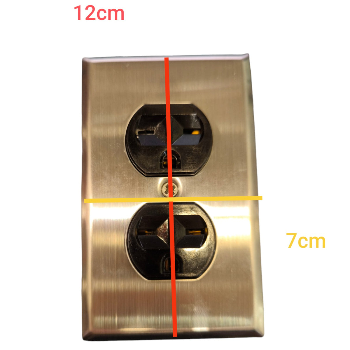 A brushed metal double electrical outlet cover plate shown on a white background with red and yellow measurement lines and text indicating dimensions 12cm and 7cm.