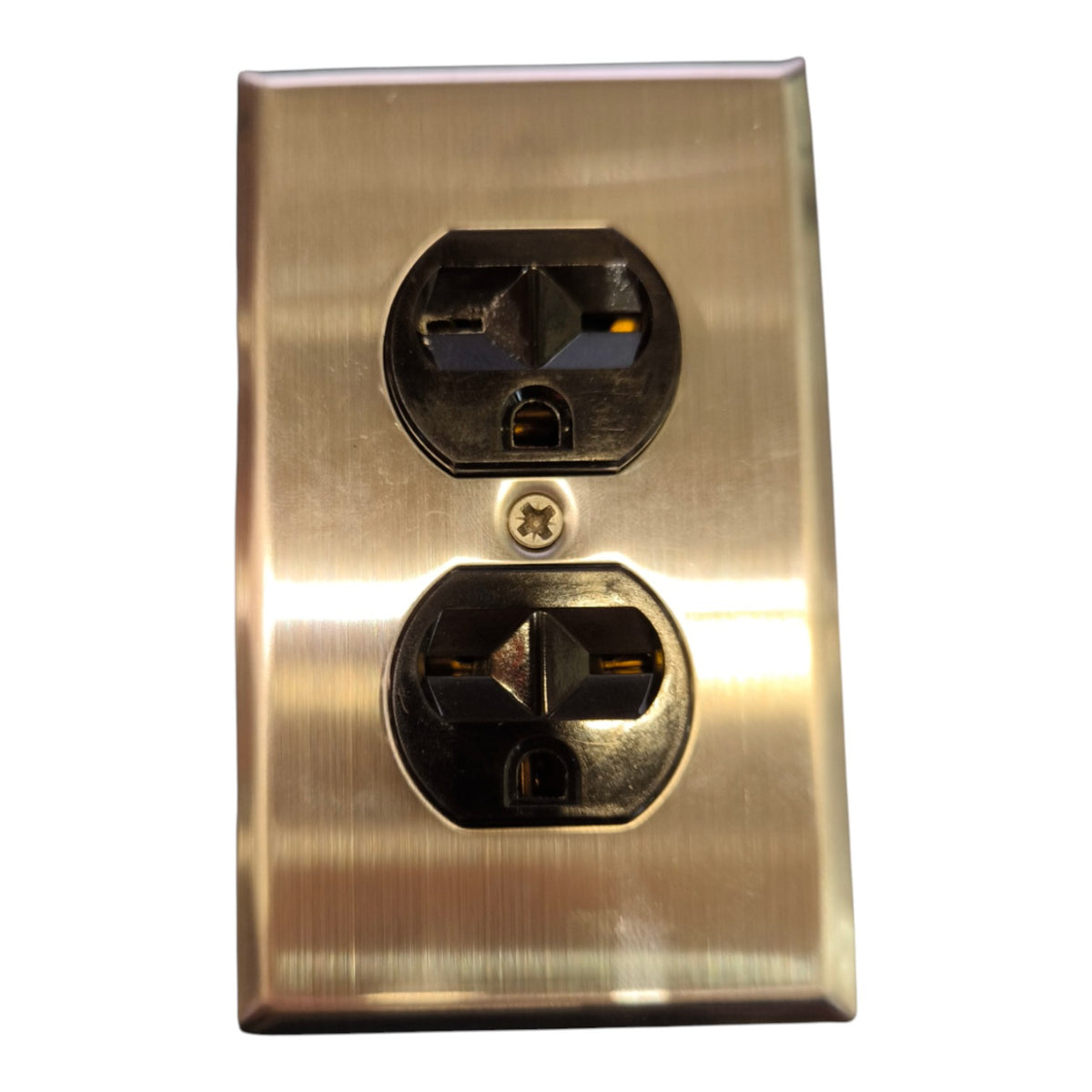 A brushed brass or gold metal double outlet electrical wall plate with two standard US sockets, shown against a plain white background.