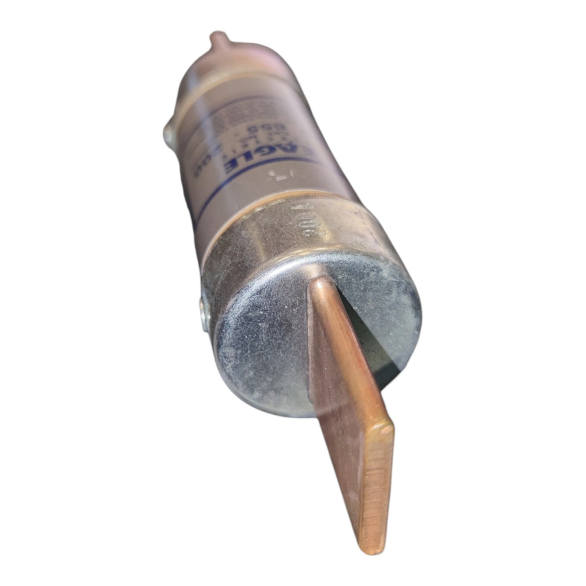 An industrial metal fuse with a copper-colored blade terminal, shown on a plain white background.