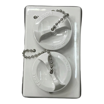 Two white plastic marine fuel cap covers with silver ball chains, mounted on a white rectangular plastic backing plate.