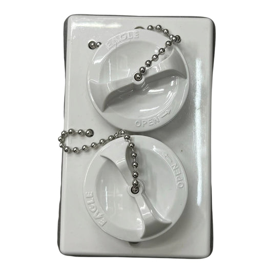 Two white plastic marine fuel cap covers with silver ball chains, mounted on a white rectangular plastic backing plate.