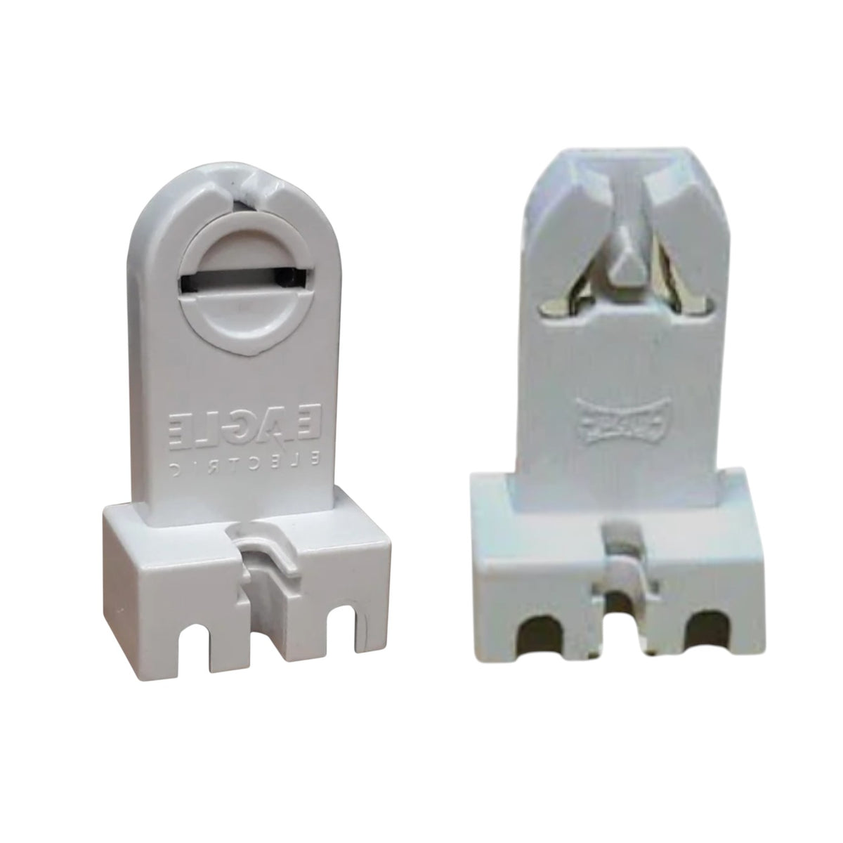 Two white plastic electrical connector components shown from front and back views on a plain white background.