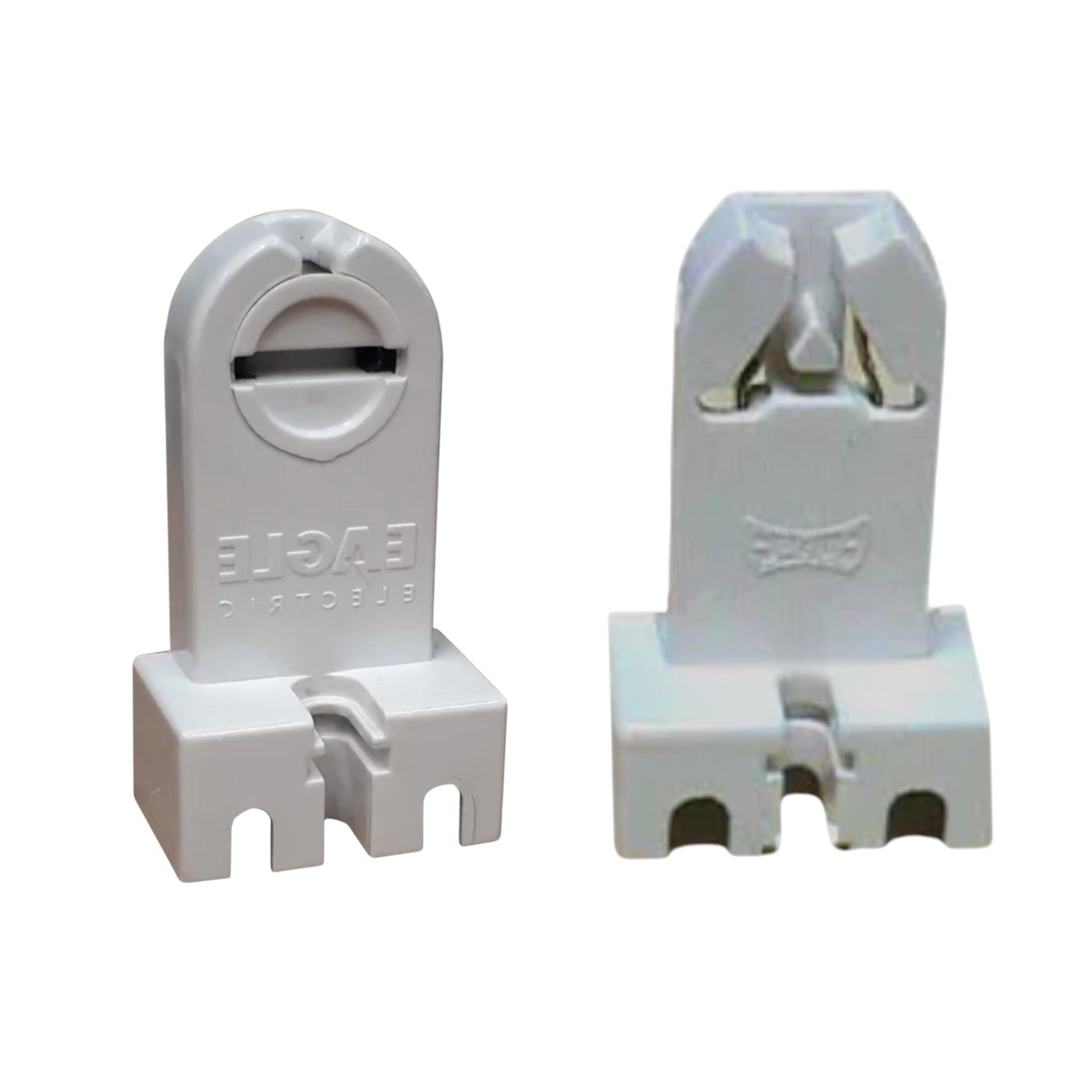 Two white plastic electrical connector components shown from front and back views on a plain white background.