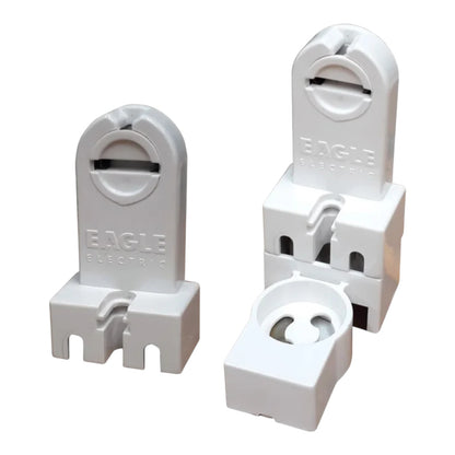 Three white plastic terminal blocks with the brand name EAGLE ELECTRIC embossed on them, shown against a plain white background.