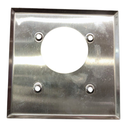A square brushed metal plate with a circular cutout in the center and four pre-drilled mounting holes, shown on a plain white background.