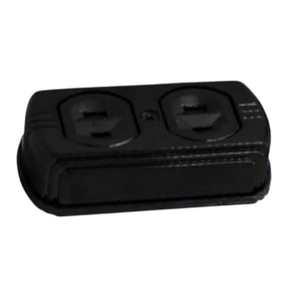 A black dual outlet electrical outlet cover or protector, shown from a three-quarters angle on a plain white background.