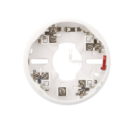 A circular white plastic electrical terminal housing or backplate with multiple metal screw terminals, small white labels, and a small red lever on the right side, shown on a plain white background.