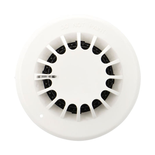 A white circular plastic smoke detector cover with radial slats and black internal elements, shown on a plain white background.