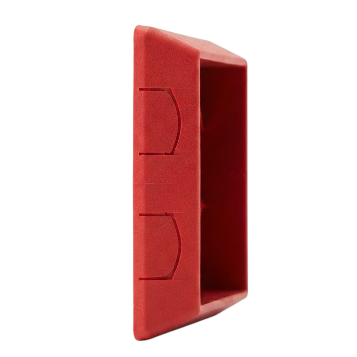 A red plastic mounting bracket or wall plate with a rectangular hollow cavity, shown from a side profile view against a plain white background.