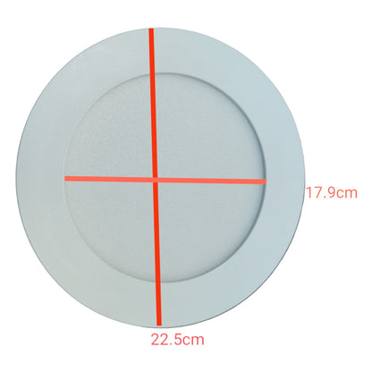 Round light fixture with red crosshair and measurements on a white background