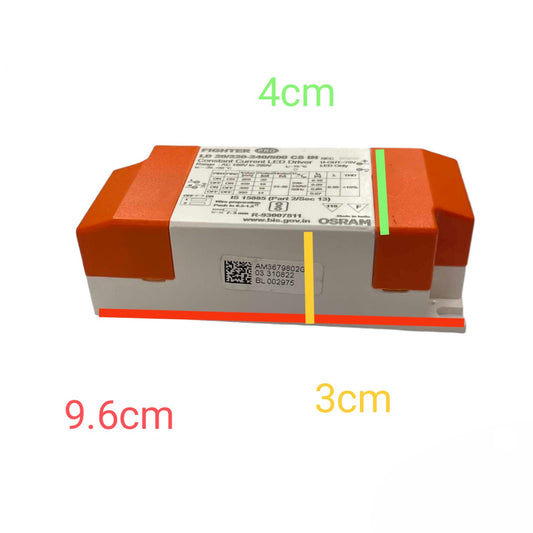 A small industrial electronic module with orange and white plastic housing, shown on a white background with overlaid dimension labels reading 4cm, 9.6cm, and 3cm.