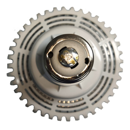 A circular metal gear or sprocket component with a central hub, shown against a plain white background.