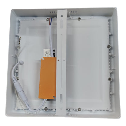 Electrical junction box with wiring and an orange component on a white background