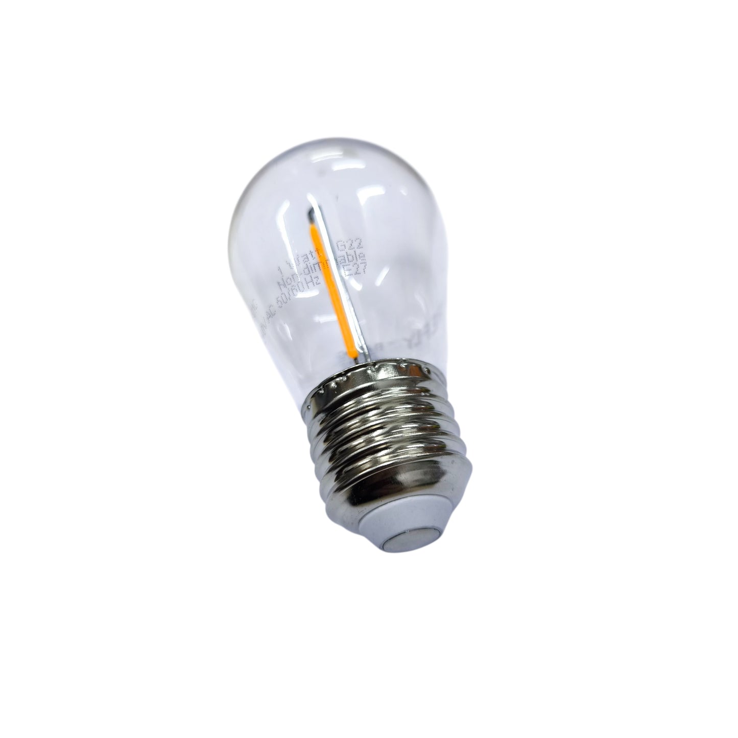 Clear light bulb with metal base on a white background
