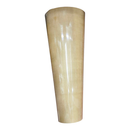 A large roll of semi-translucent beige adhesive film or tape, standing vertically against a plain white background.