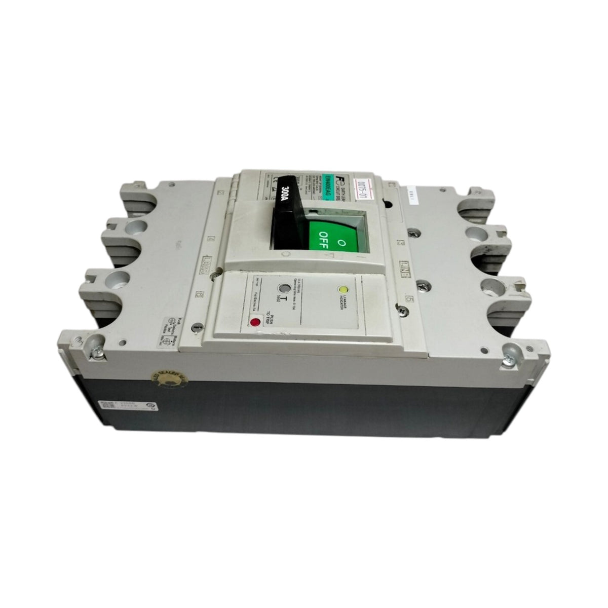 A large industrial electrical circuit breaker with a gray metal housing, black base, and a green switch handle, photographed on a plain white background.