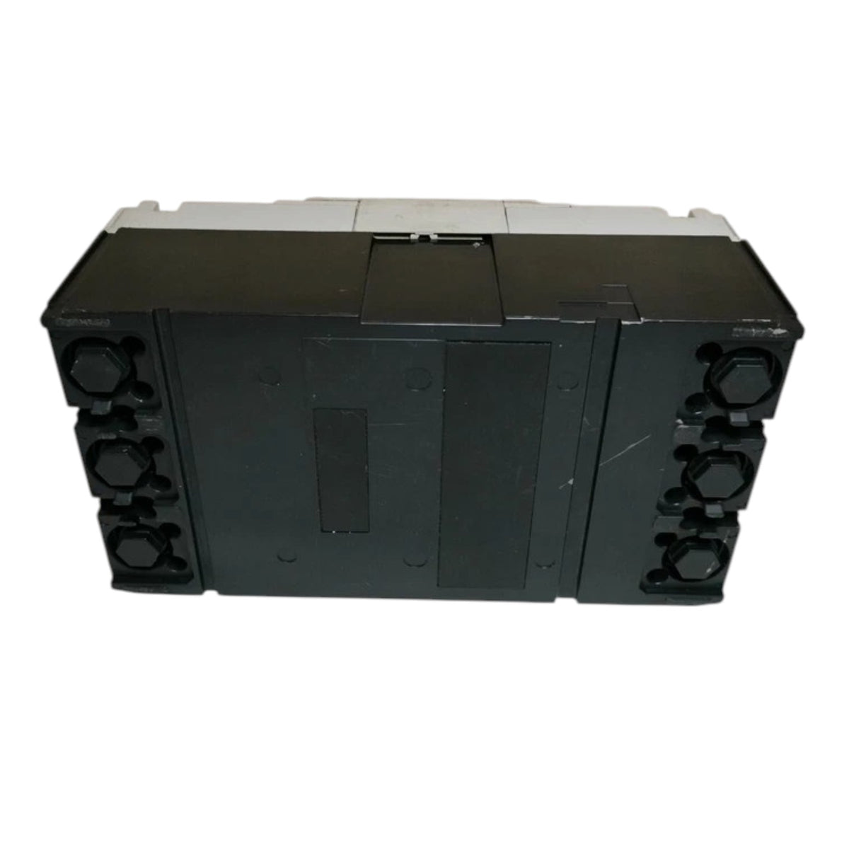 A black industrial electrical component or terminal block with multiple circular connector ports on both sides, photographed against a plain white background.