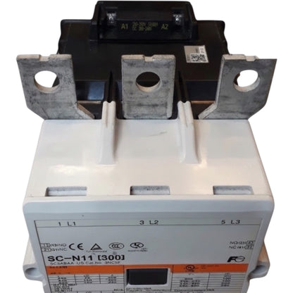 A Schneider Electric SC-N11 (3001) molded circuit breaker with a white plastic housing, gray metal terminal bars, and a black top cover, shown on a white background.