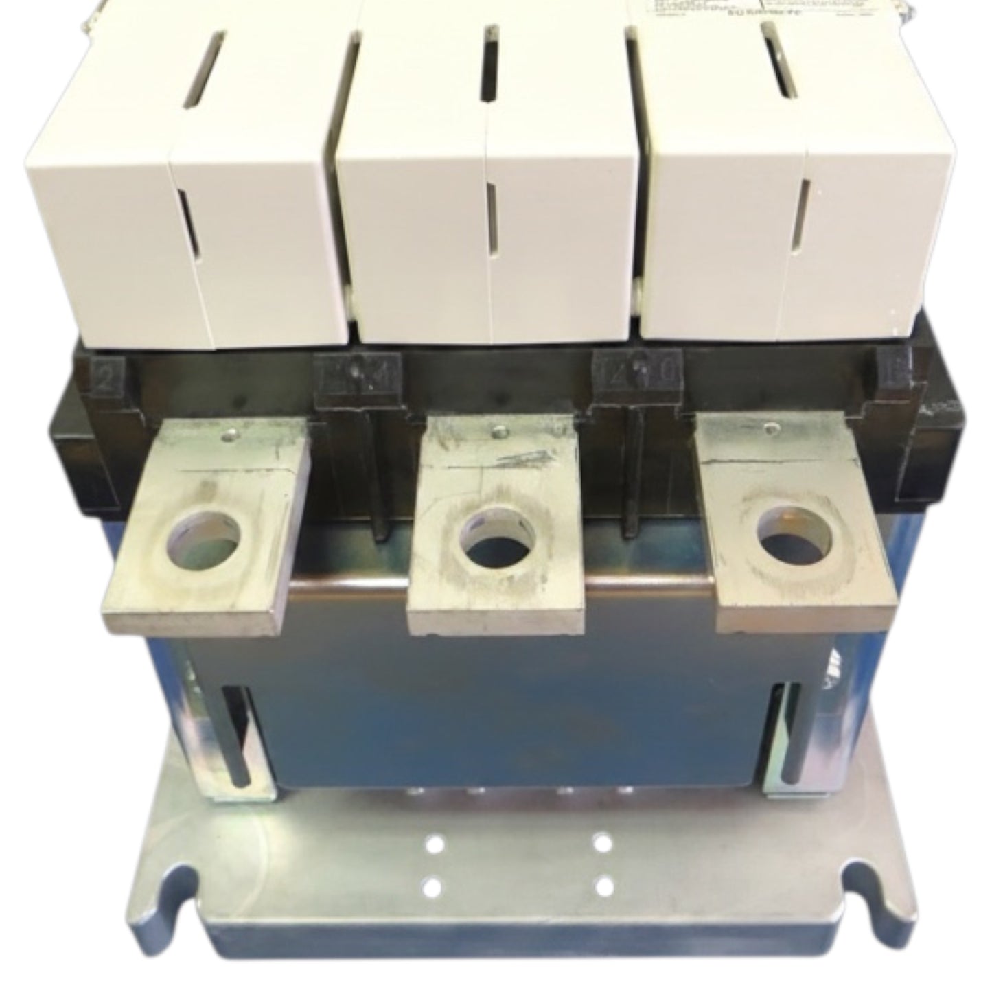A three-phase industrial electrical component, likely a transformer or contactor, featuring white plastic top housings, a black central frame, silver metal terminal blocks, and a blue-gray base plate.