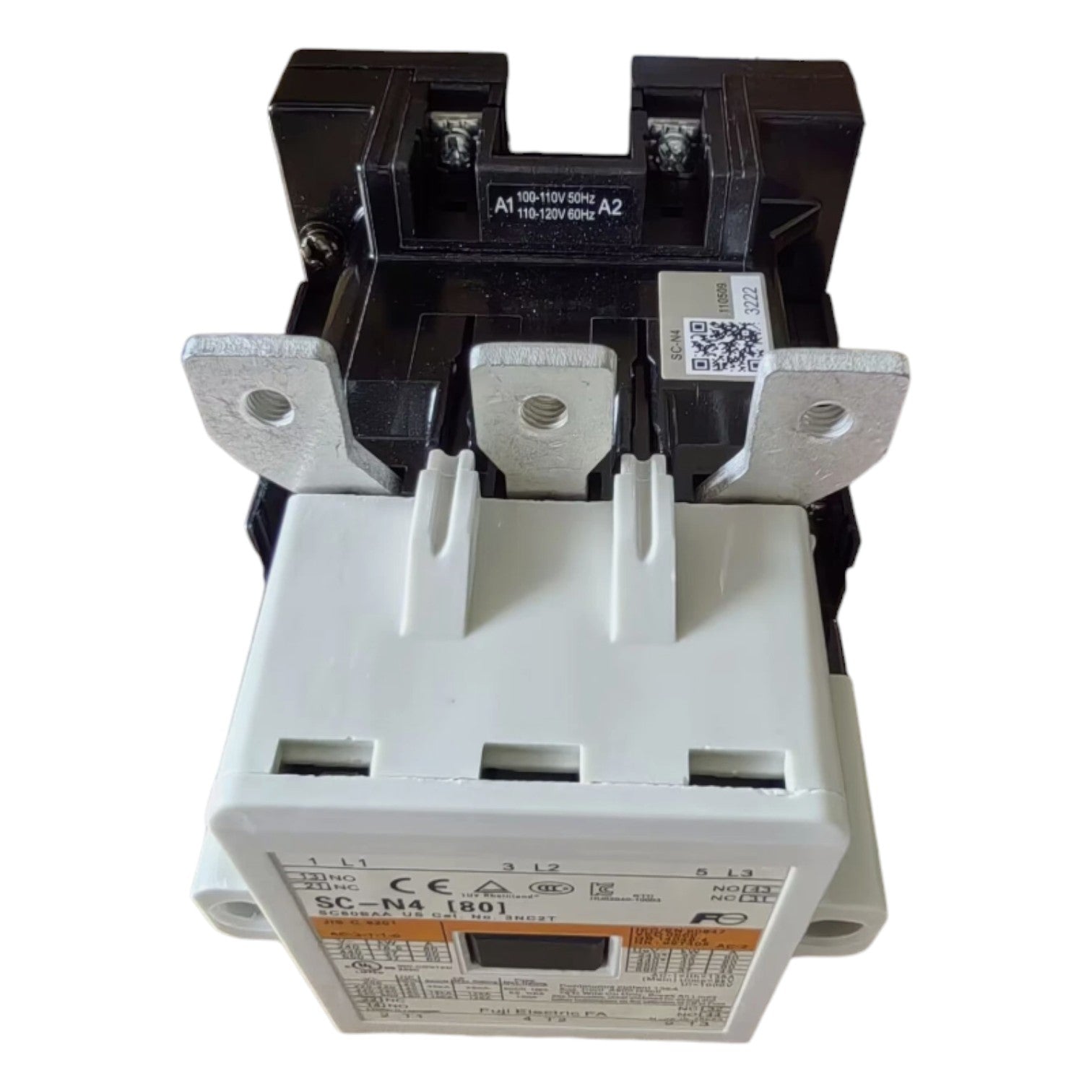 Electrical contactor with black and white casing on a white background