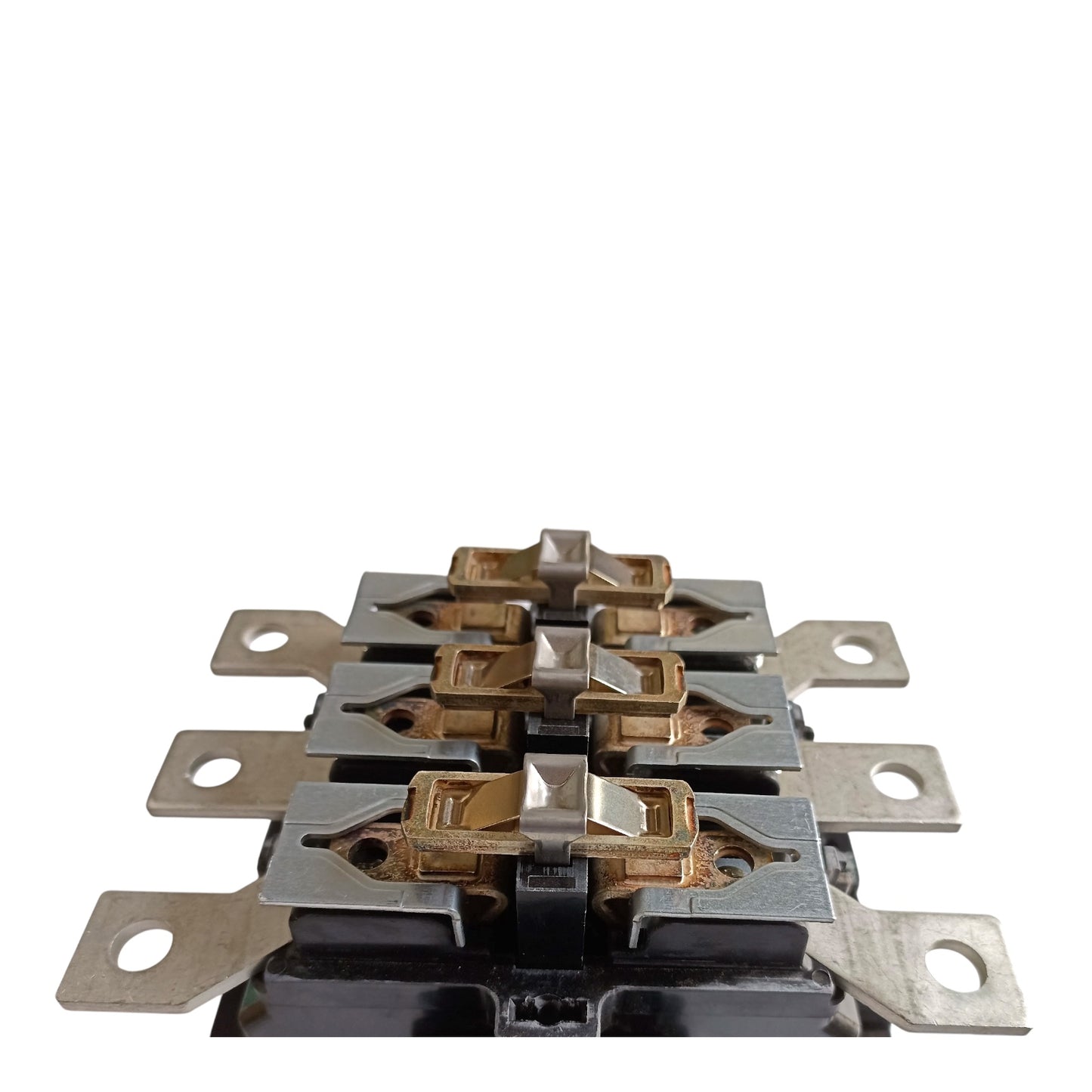 A close-up of a multi-contact electrical terminal block or connector with silver metal plates, gold-toned internal contacts, and a black base, shown on a plain white background.